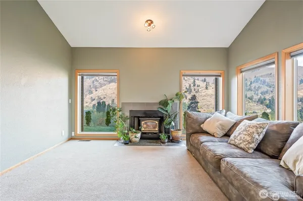 a living room with furniture and a window