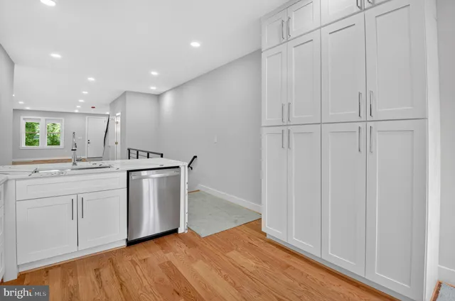 a view of a kitchen with electric appliances