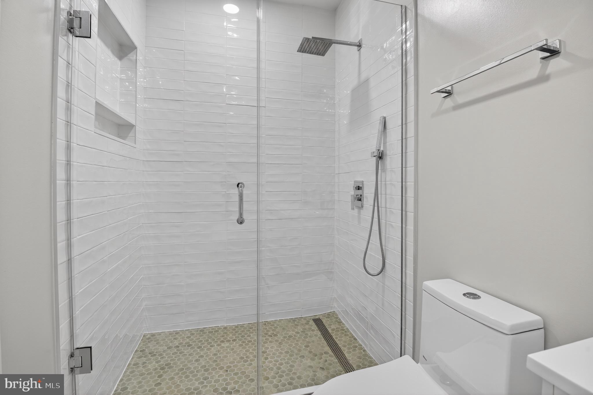 3712 13th Street Northwest Washington, DC 20010 - Photo 25 of 35 Sleek modern shower with elegant finishes.