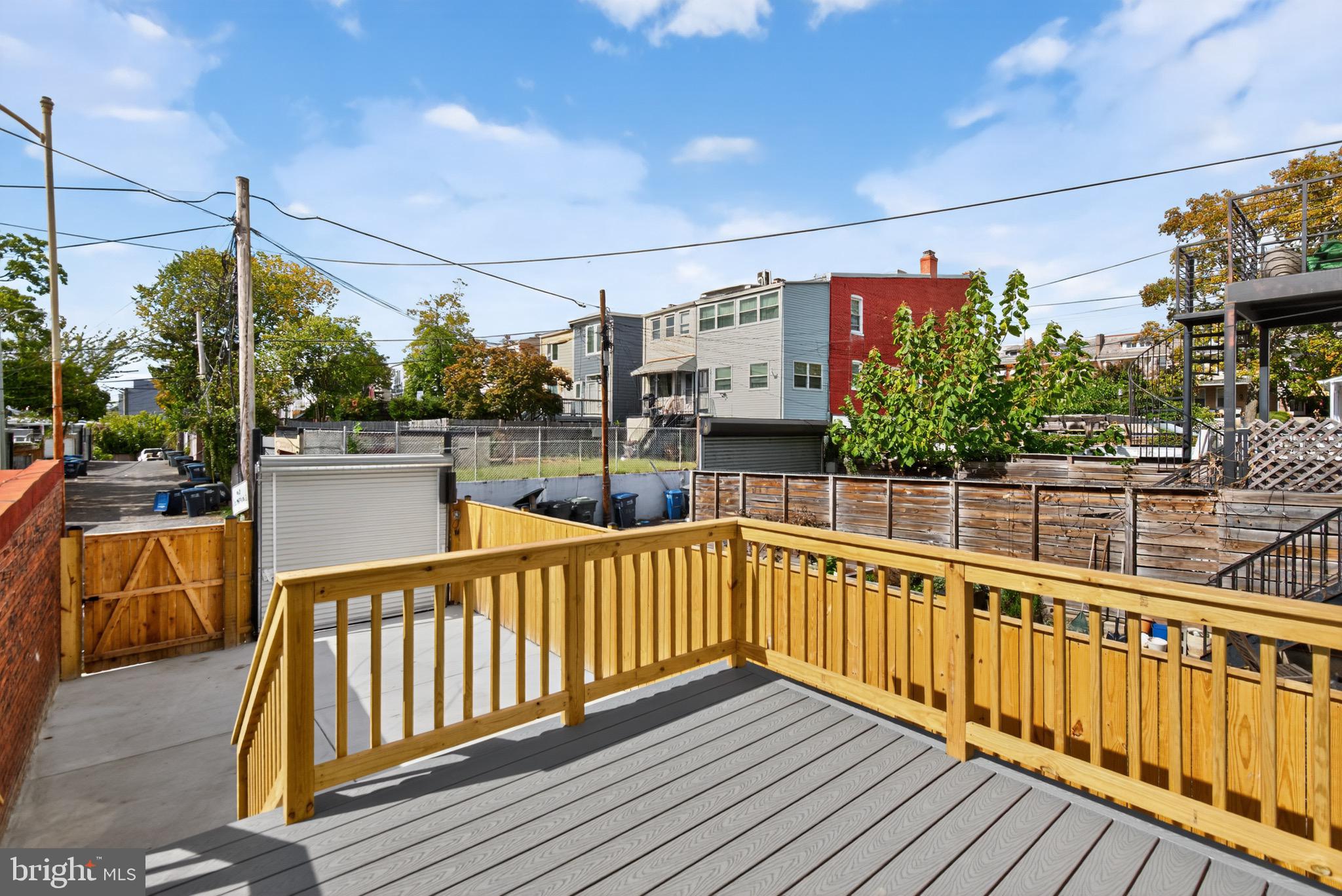 3712 13th Street Northwest Washington, DC 20010 - Photo 30 of 35 Sunny outdoor deck with urban views.