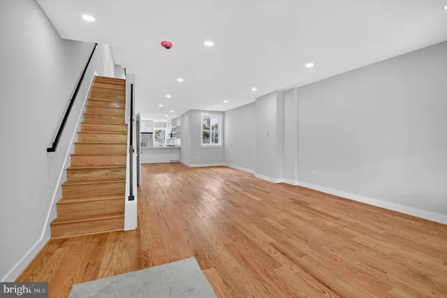a view of entryway with wooden floor