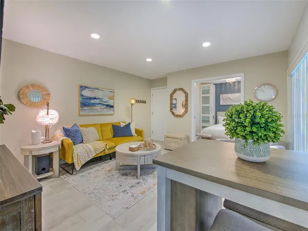 a view of a balcony with furniture