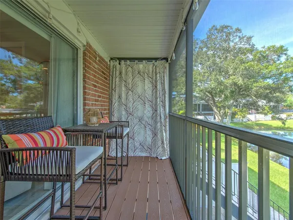a view of a balcony with outdoor space