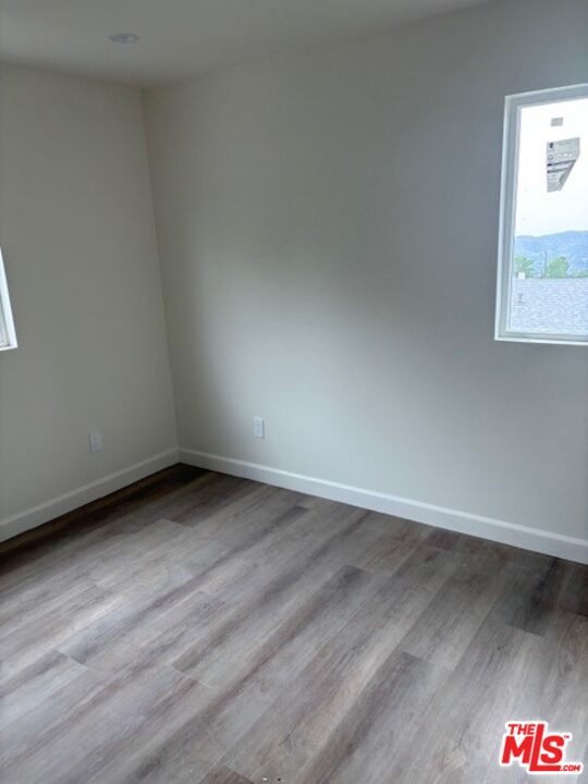 7072 Summitrose Street Tujunga, CA 91042 - Photo 7 of 10 a view of an empty room and window