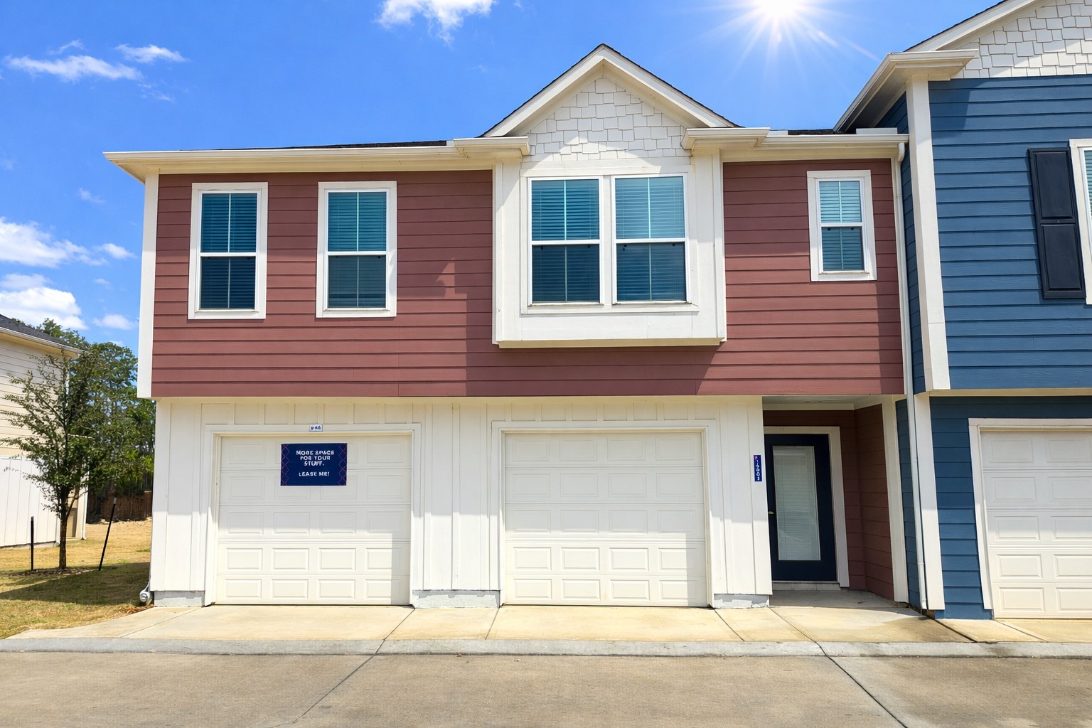 Townhome - Living area on second floor. Tandem 2-car garage located on first floor with access to rear covered patio.