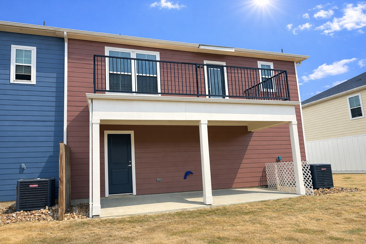 15770 Old Conroe Road, Unit 15003 Conroe, TX 77384 - Photo 2 of 16 Townhome with large patio upstairs and covered patio downstairs, accessed through the rear of the garage.