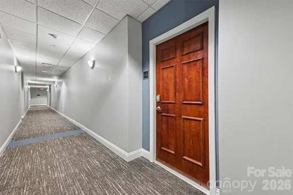 a view of a hallway with closet
