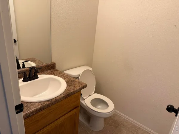 a bathroom with a sink and a toilet