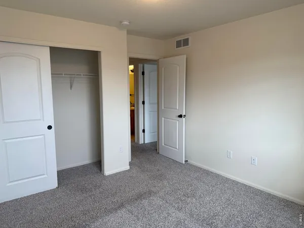 an empty room with closet