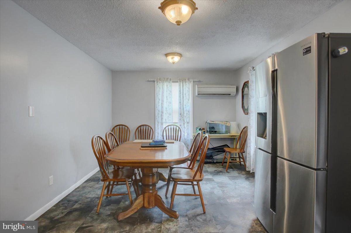 8582 Rice Road Shippensburg, PA 17257 - Photo 12 of 41 a view of a dining room with furniture