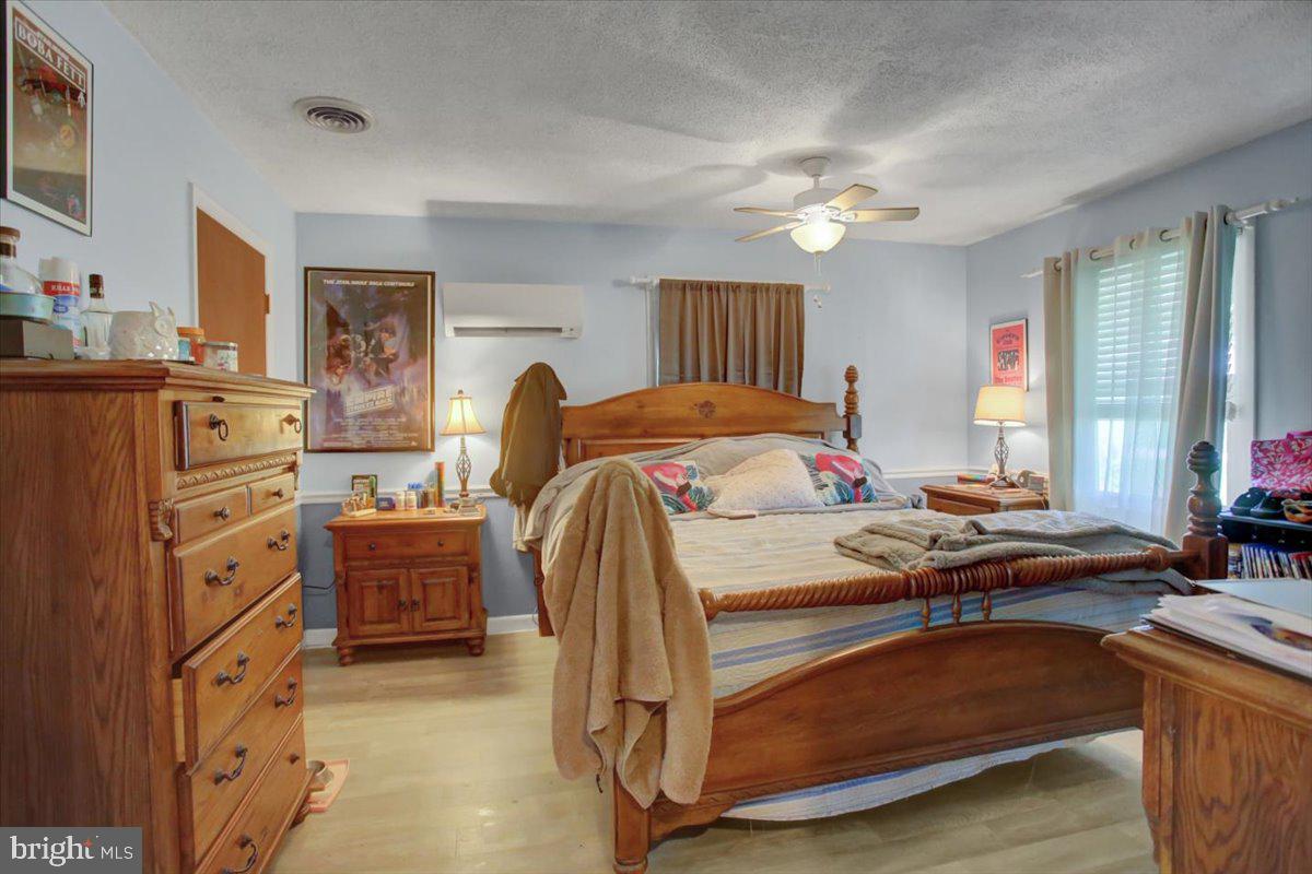 8582 Rice Road Shippensburg, PA 17257 - Photo 21 of 41 a bedroom with bed and window