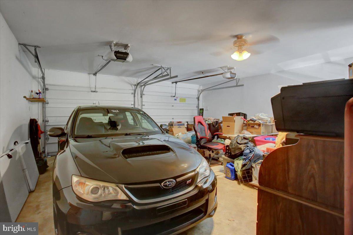 8582 Rice Road Shippensburg, PA 17257 - Photo 27 of 41 a car parked in a garage