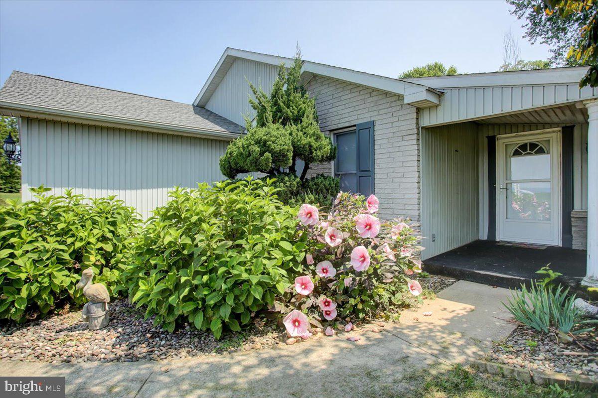 8582 Rice Road Shippensburg, PA 17257 - Photo 40 of 41 a front view of a house with a yard