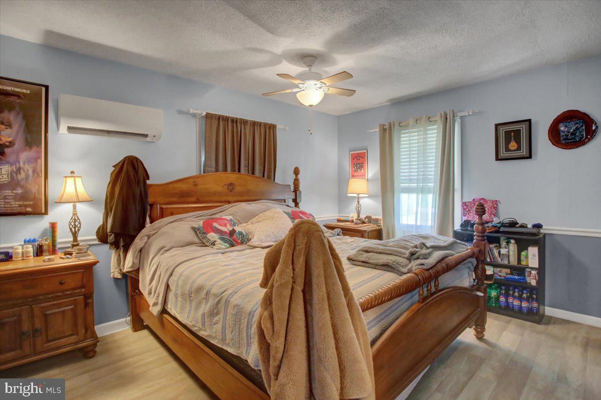 8582 Rice Road Shippensburg, PA 17257 - Photo 4 of 41 a bedroom with a bed and dresser