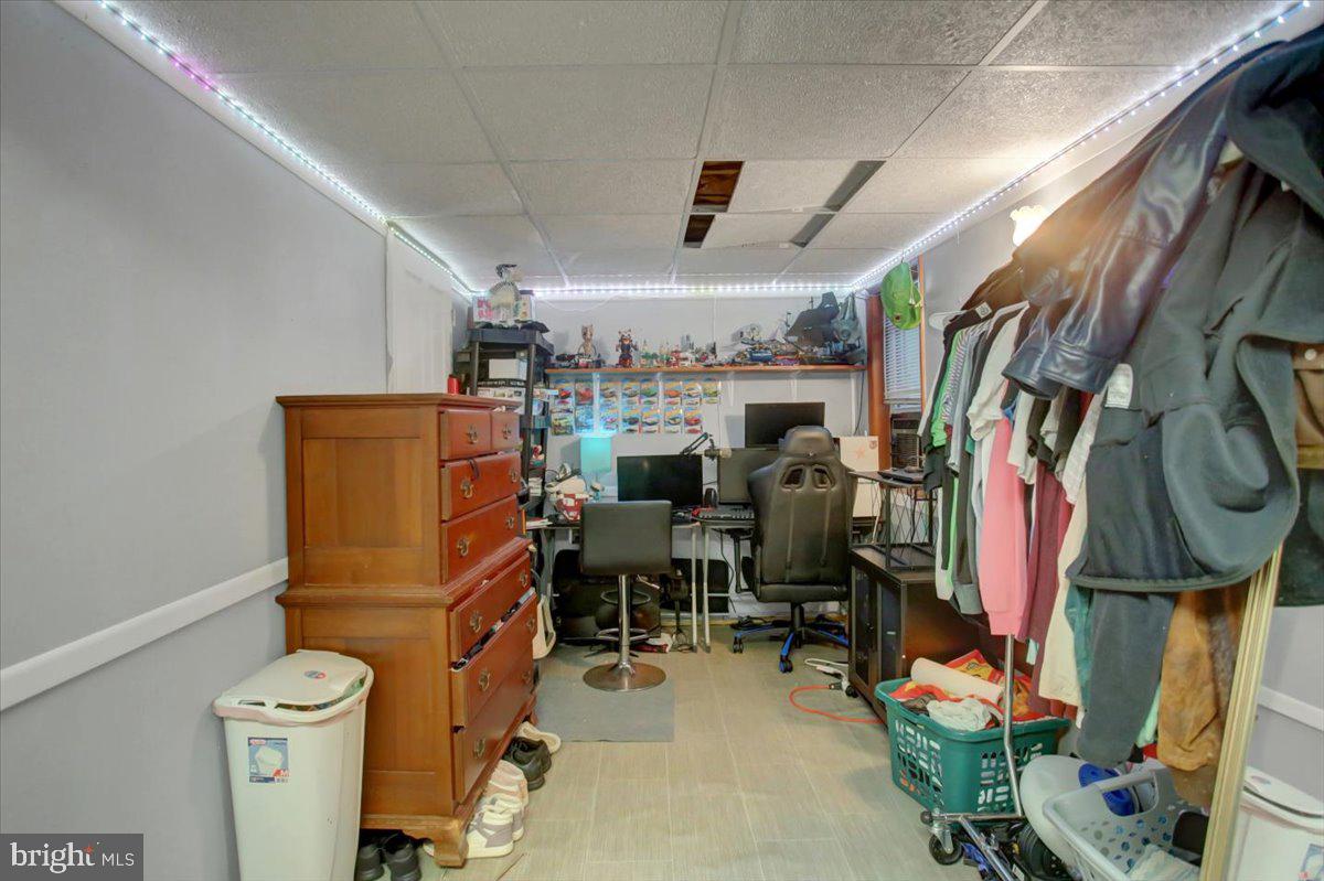 8582 Rice Road Shippensburg, PA 17257 - Photo 41 of 41 a view of walk in closet with clothes and shoes