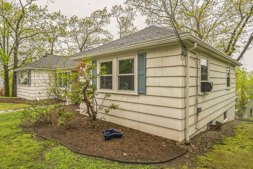 171 Virginia Road Waltham, MA 02453 - Photo 3 of 25 a view of a house with a backyard