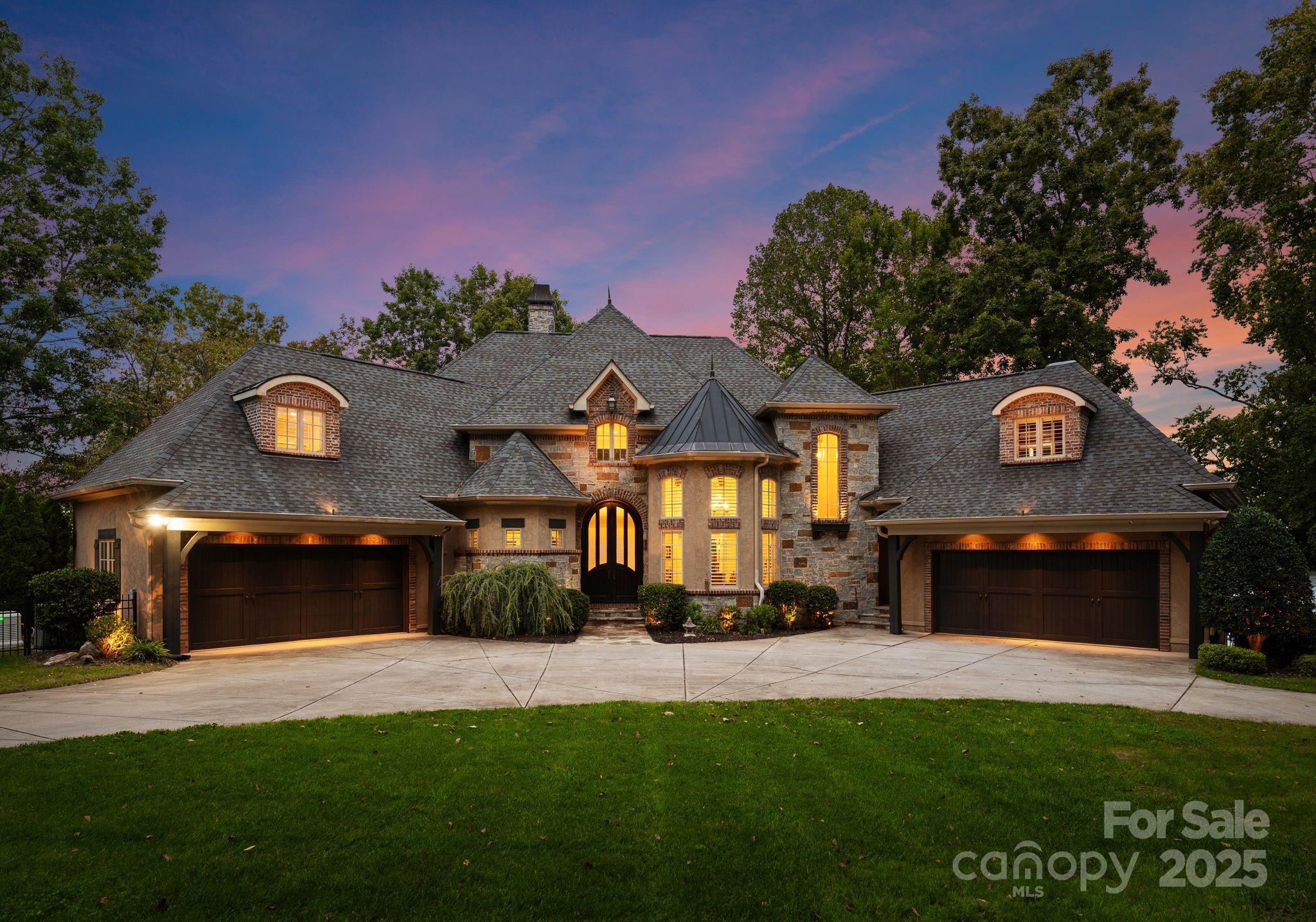 115 Emerald Point Lane Mooresville, NC 28117 - Photo 1 of 38 a front view of a house with a yard and a garage