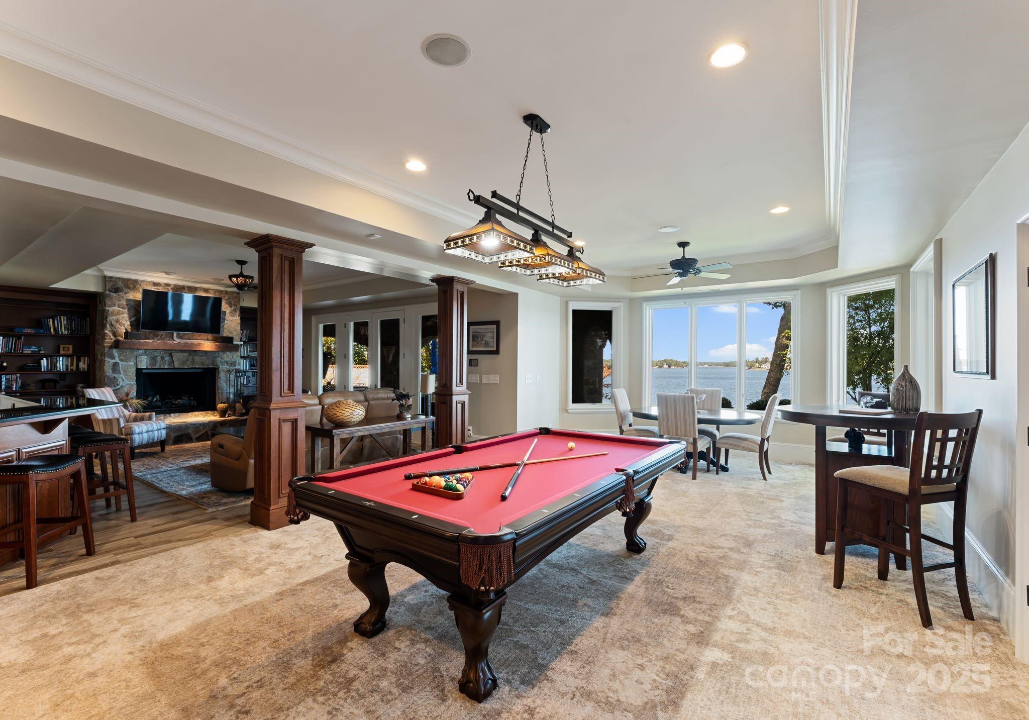 115 Emerald Point Lane Mooresville, NC 28117 - Photo 21 of 38 a living room with furniture pool table and windows