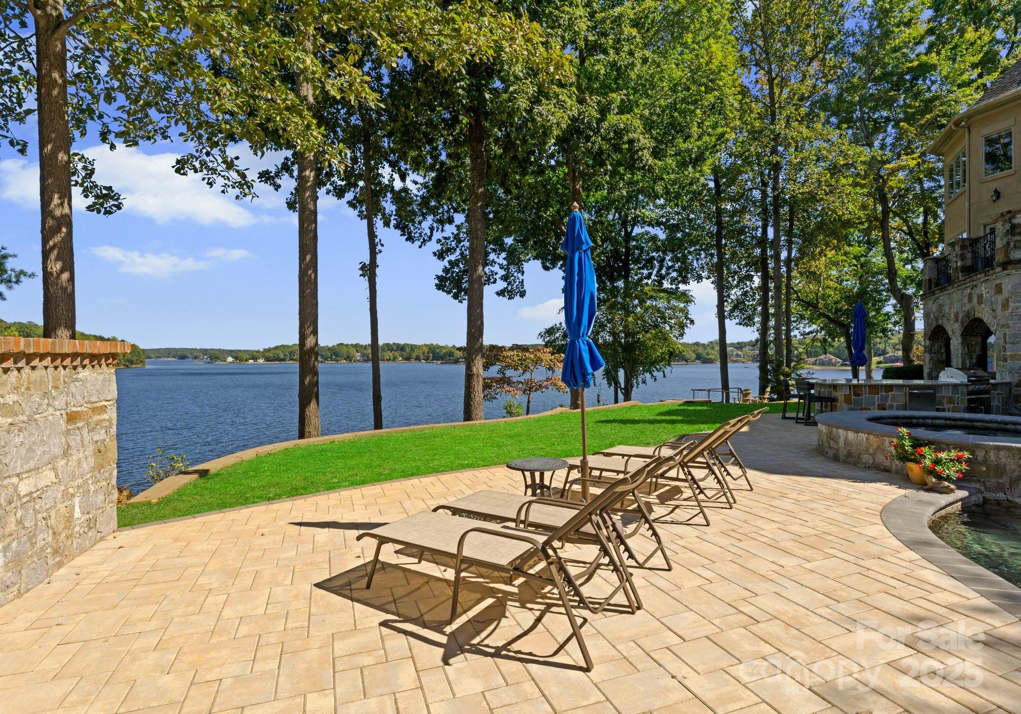 115 Emerald Point Lane Mooresville, NC 28117 - Photo 34 of 38 a view of a backyard with sitting area