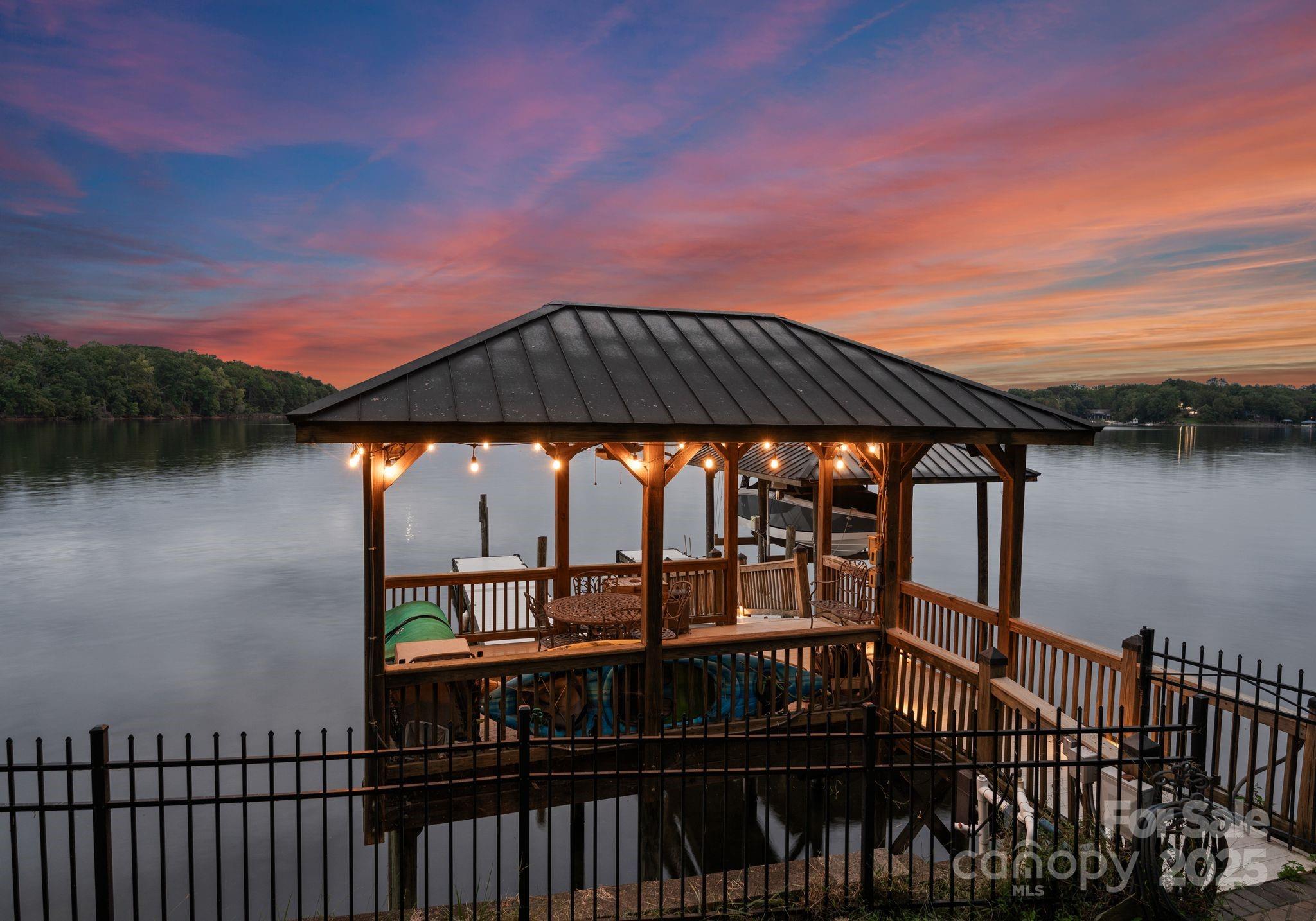 115 Emerald Point Lane Mooresville, NC 28117 - Photo 35 of 38 a view of house with roof deck and outdoor seating