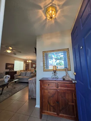 a living room with furniture and a couch