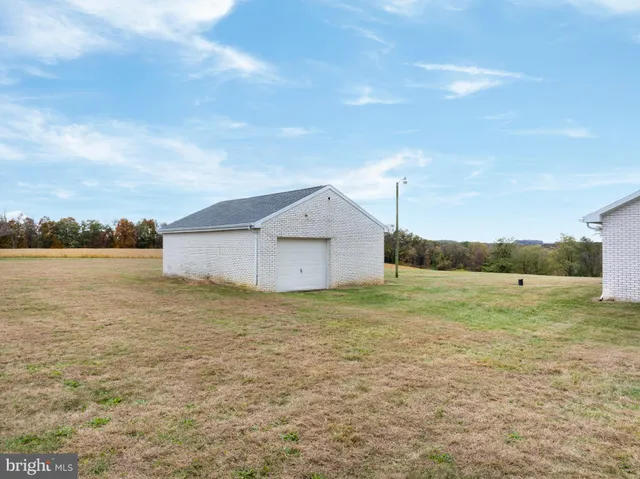 a view of big yard with a big room