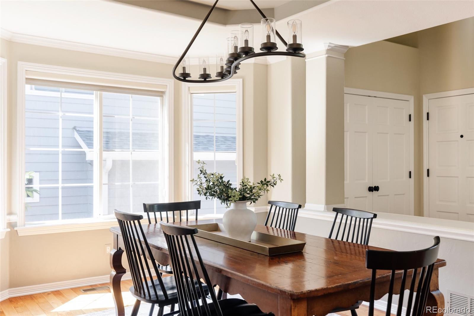 1347 Pine View Road Golden, CO 80403 - Photo 11 of 50 a view of a dining room with furniture window and outside view