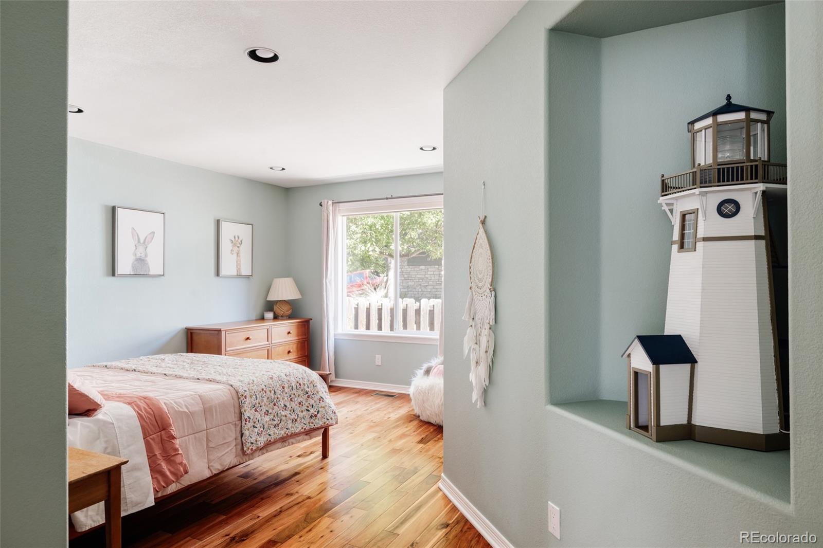 1347 Pine View Road Golden, CO 80403 - Photo 23 of 50 a bedroom with a bed and a window