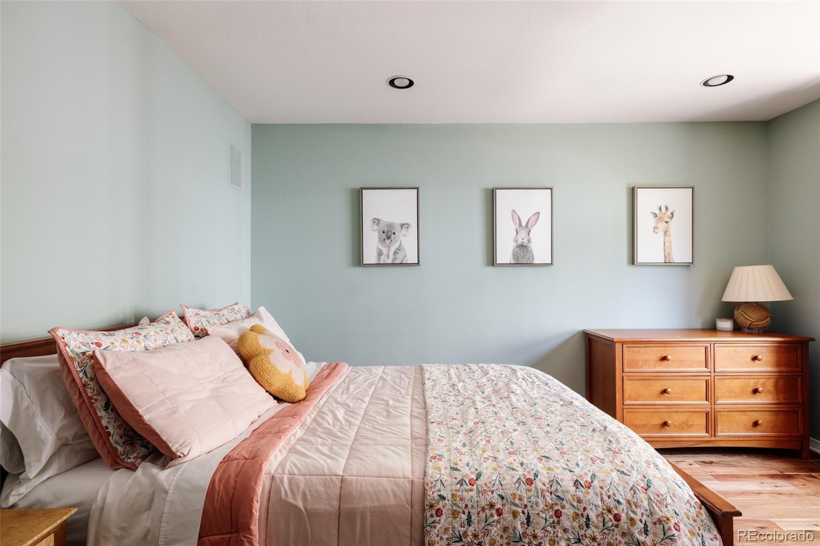 1347 Pine View Road Golden, CO 80403 - Photo 24 of 50 a bedroom with a bed and dresser