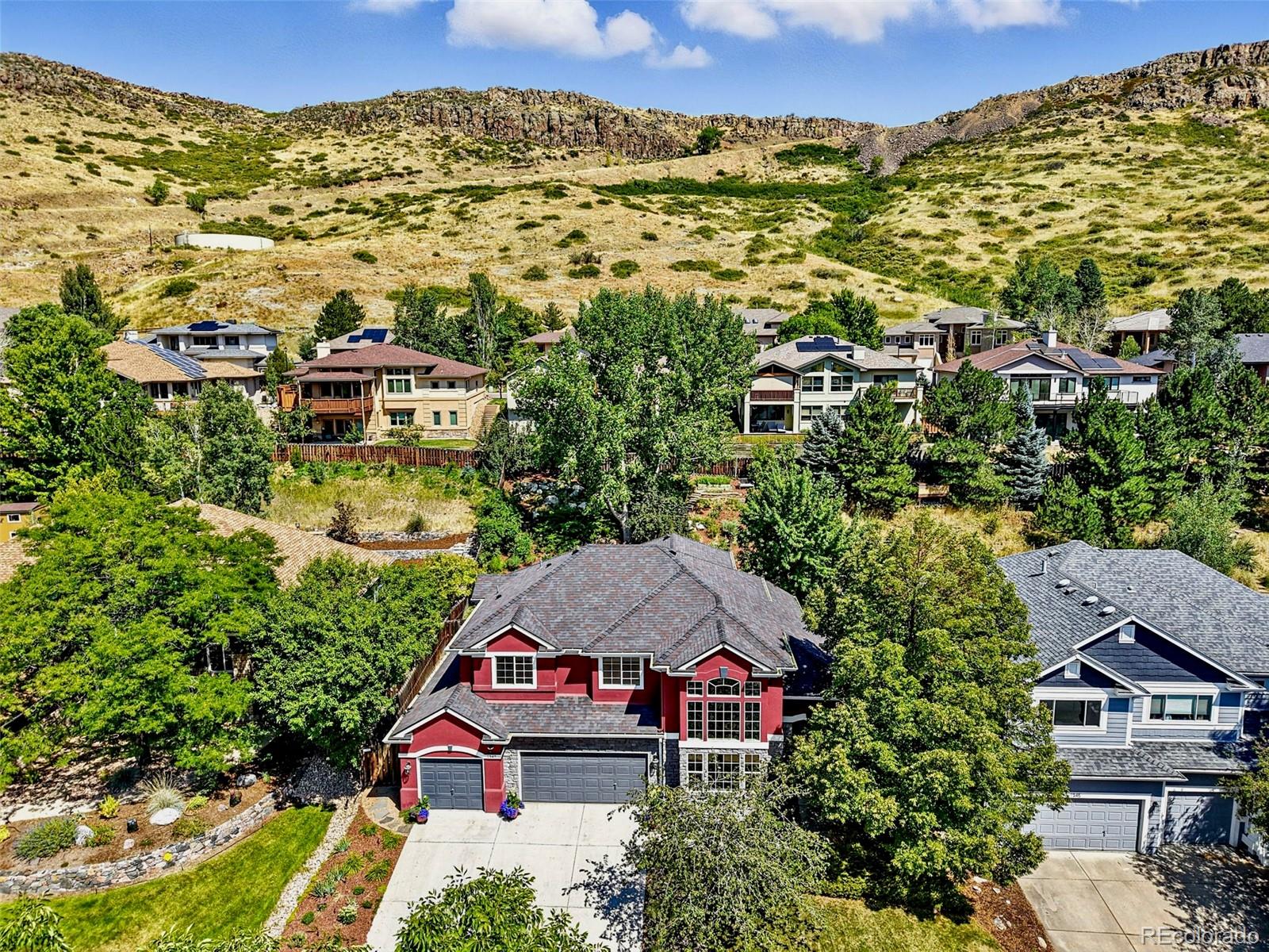 1347 Pine View Road Golden, CO 80403 - Photo 4 of 50 an aerial view of residential houses with outdoor space and trees
