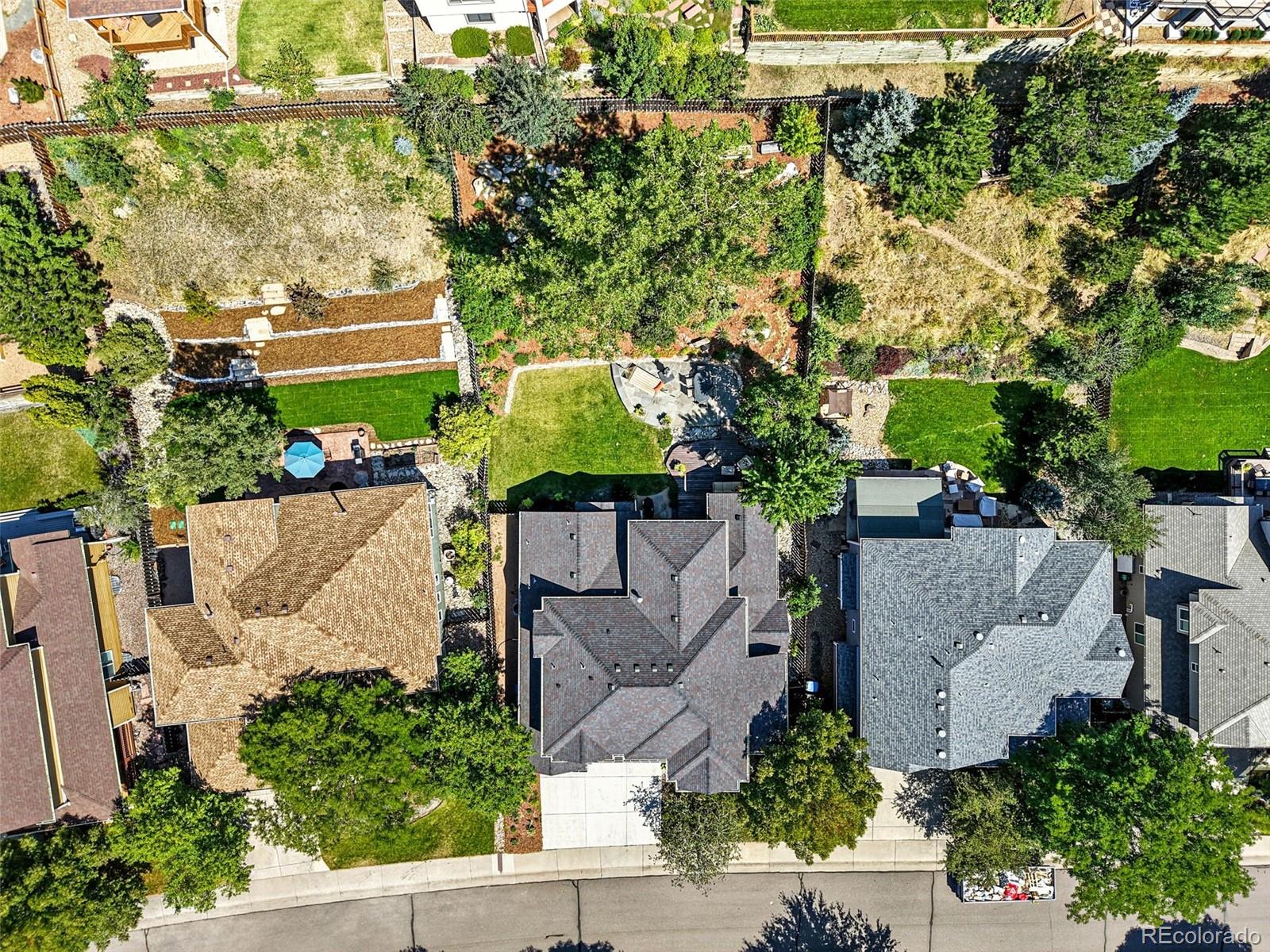 1347 Pine View Road Golden, CO 80403 - Photo 44 of 50 an aerial view of a house with a garden and plants