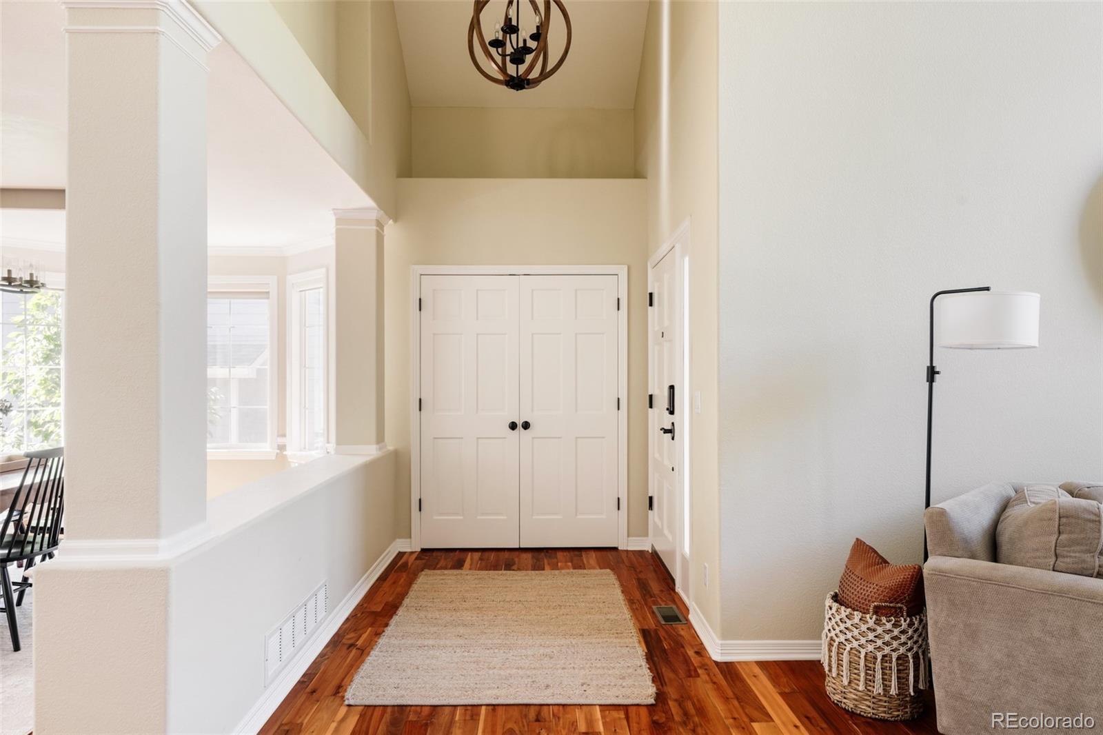 1347 Pine View Road Golden, CO 80403 - Photo 9 of 50 a hallway with windows and bathroom