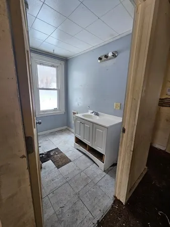 a bathroom with a tub and a shower