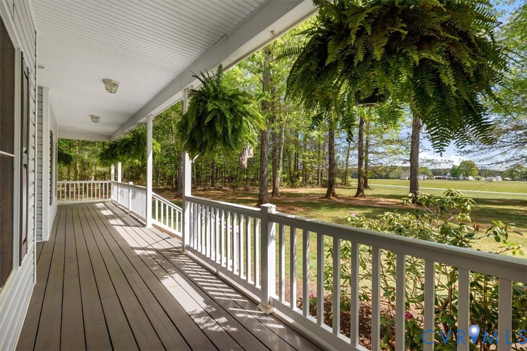 3060 Moyer Road Powhatan, VA 23139 - Photo 8 of 66 Expansive covered porch with wood-finish flooring,