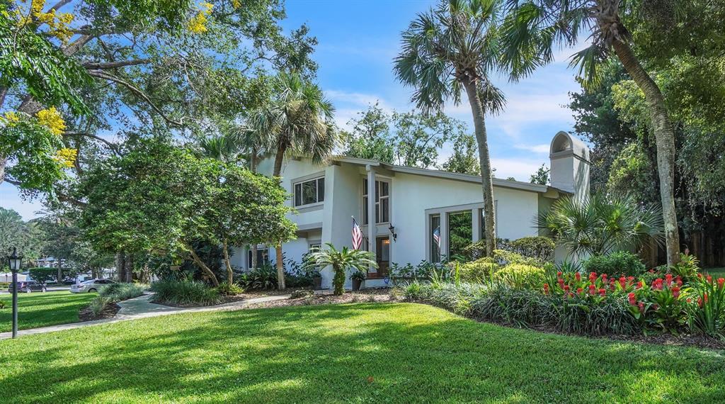 114 Variety Tree Circle Altamonte Springs, FL 32714 - Photo 1 of 1 a view of a house with a yard and potted plants