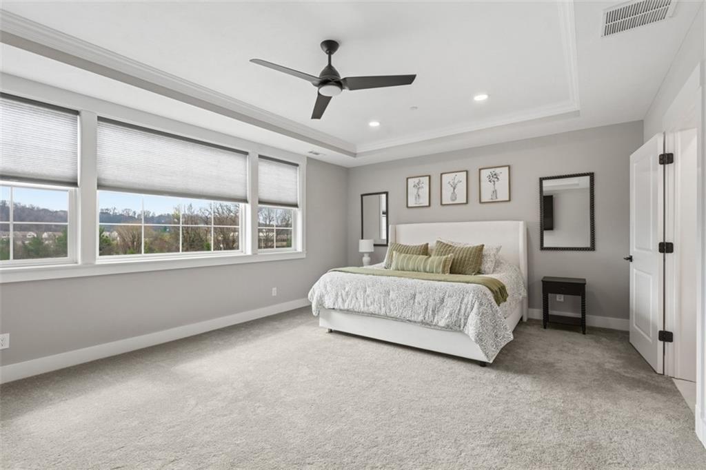 146 Enclave Drive Mars, PA 16046 - Photo 13 of 48 a spacious bedroom with a large bed chandelier and a window