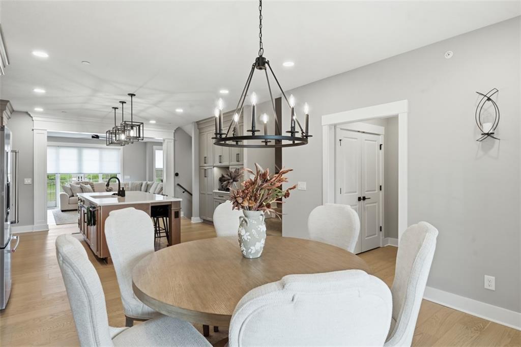 146 Enclave Drive Mars, PA 16046 - Photo 33 of 48 a view of a dining room with furniture and wooden floor