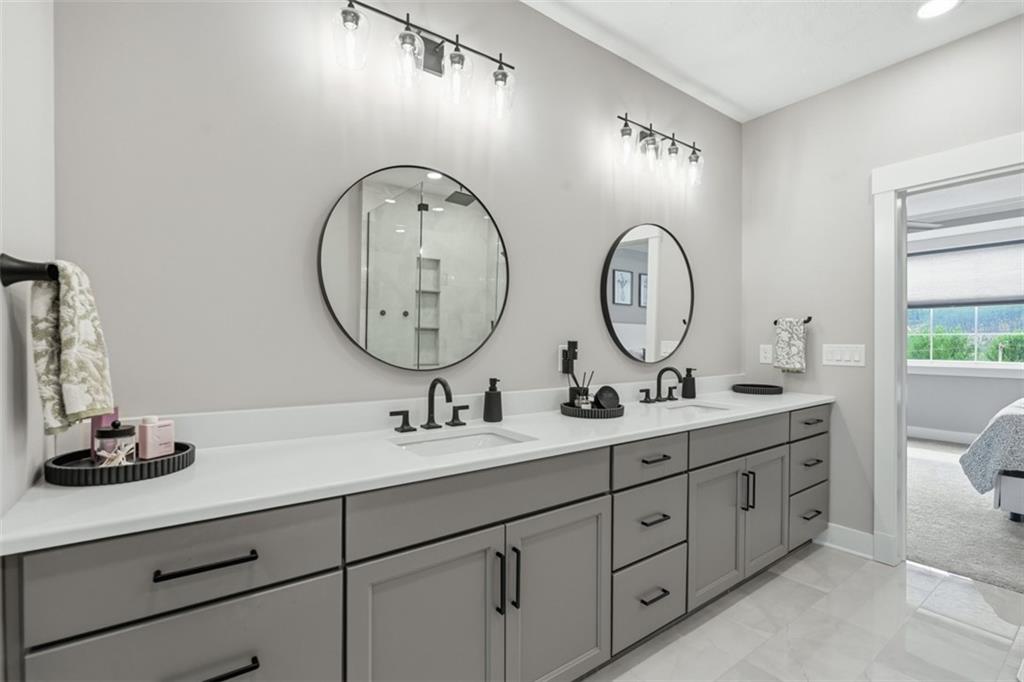 146 Enclave Drive Mars, PA 16046 - Photo 39 of 48 a bathroom with a double vanity sink and a mirror
