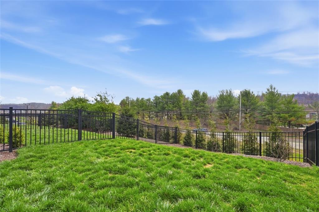 146 Enclave Drive Mars, PA 16046 - Photo 41 of 48 a view of a backyard with a lake view