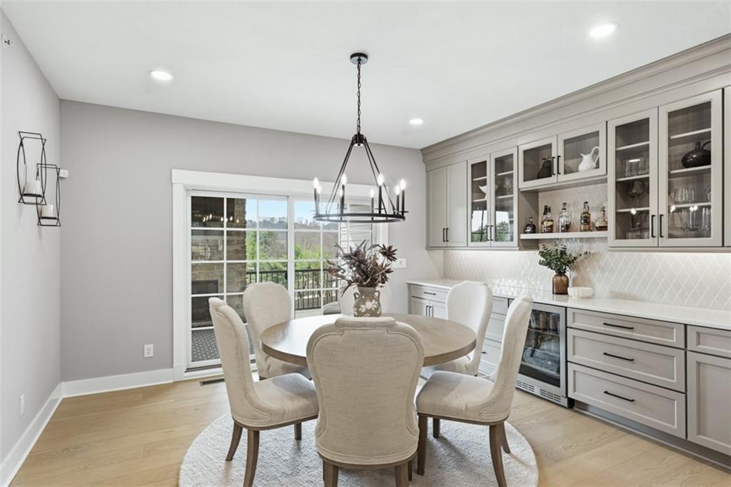 146 Enclave Drive Mars, PA 16046 - Photo 5 of 48 a dining room with furniture a chandelier and wooden floor
