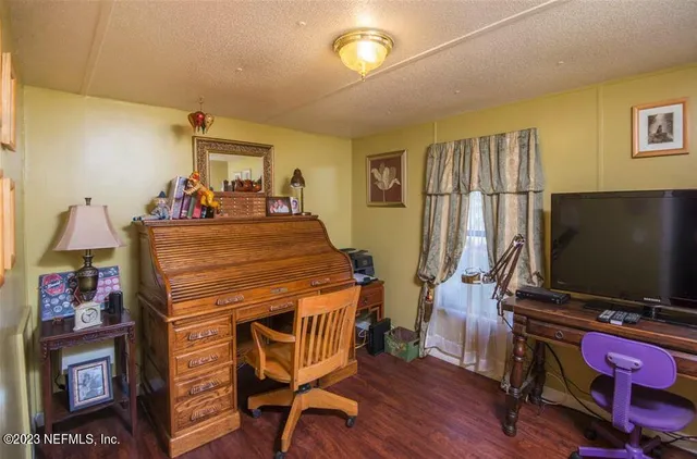 a view of a house with a swimming pool