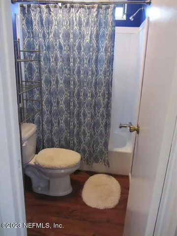 a view of a livingroom with a window