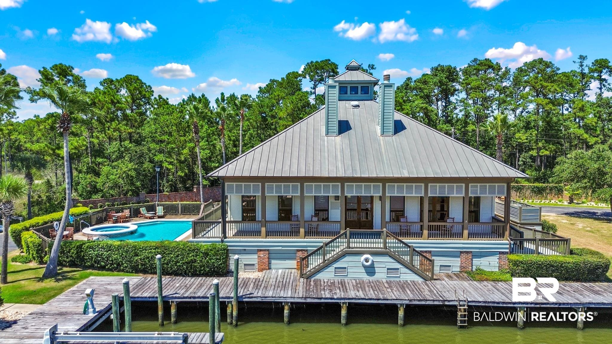 3882 Lafitte Boulevard Gulf Shores, AL 36542 - Photo 13 of 28 rear of clubhouse
