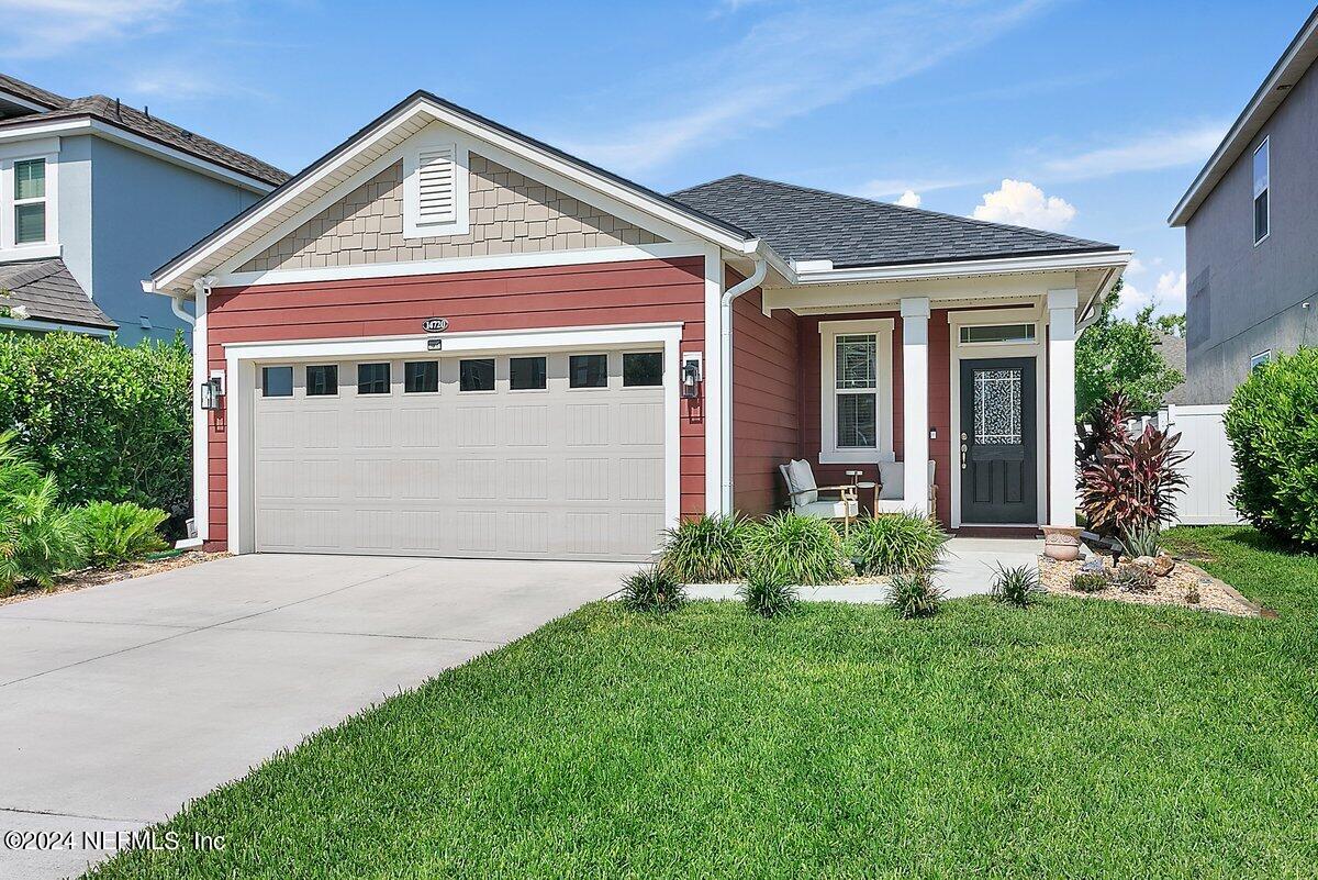 14720 Trellis Street Jacksonville, FL 32258 - Photo 1 of 21 front view of house with a yard