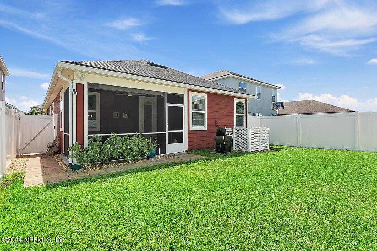 14720 Trellis Street Jacksonville, FL 32258 - Photo 19 of 21 a view of a house with backyard
