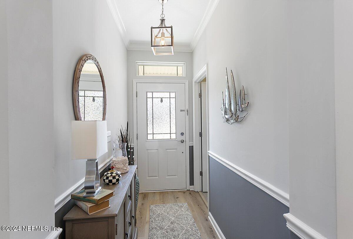 14720 Trellis Street Jacksonville, FL 32258 - Photo 3 of 21 a view of a room with bed and mirror