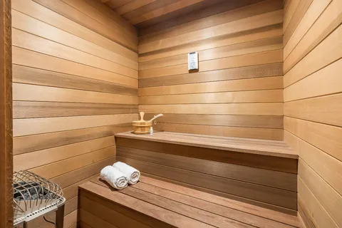 a bathroom with a sink and vanity