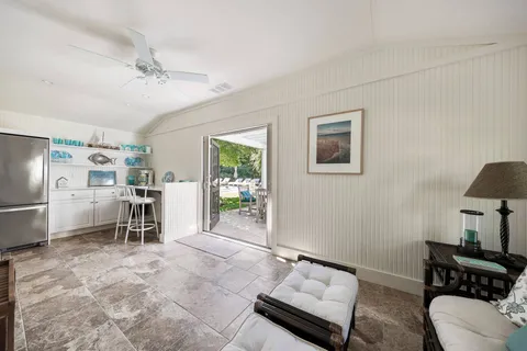a living room with furniture and a table
