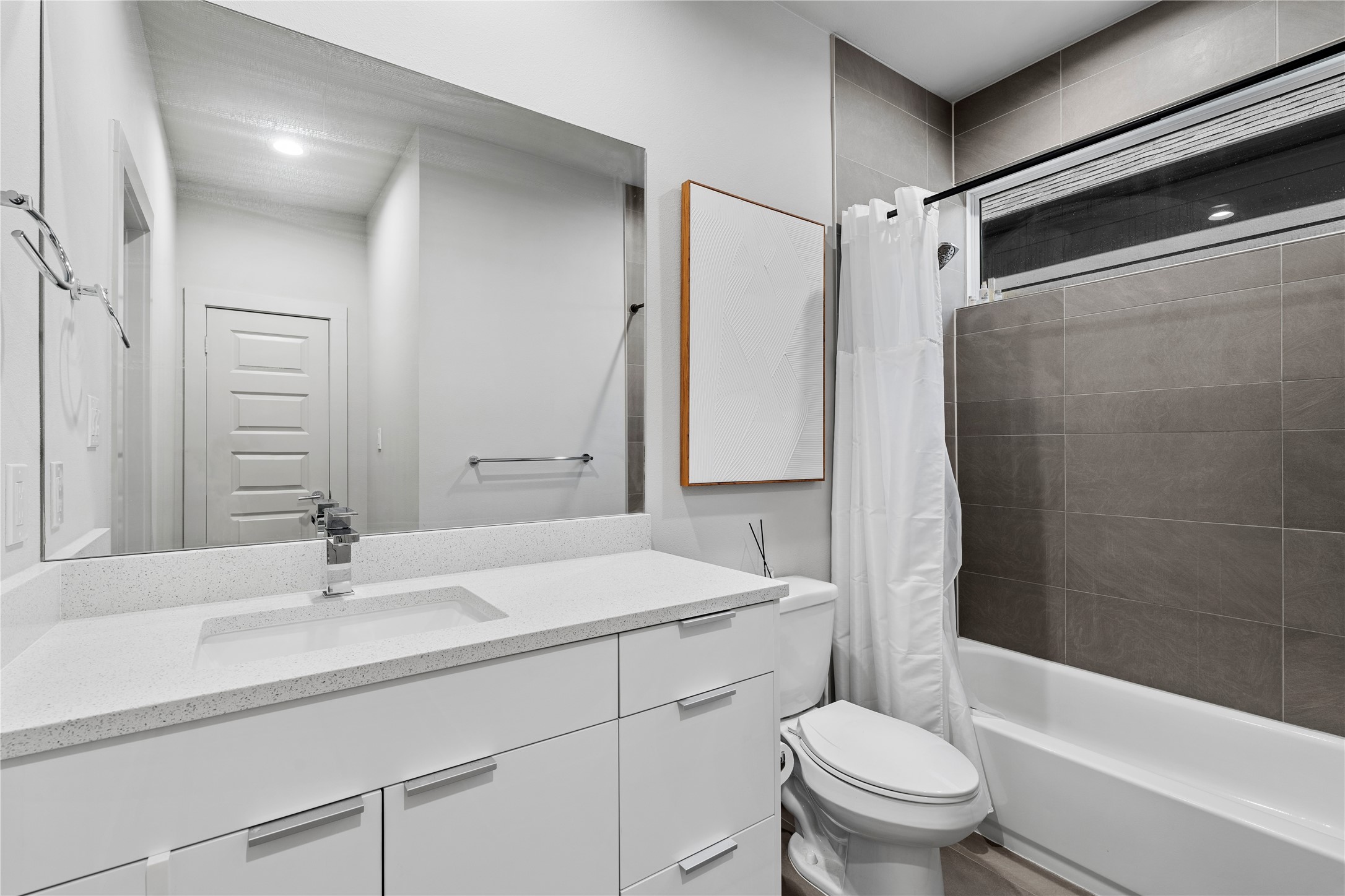 6813 Rocinante Lane Houston, TX 77092 - Photo 21 of 25 a bathroom with a sink toilet and shower