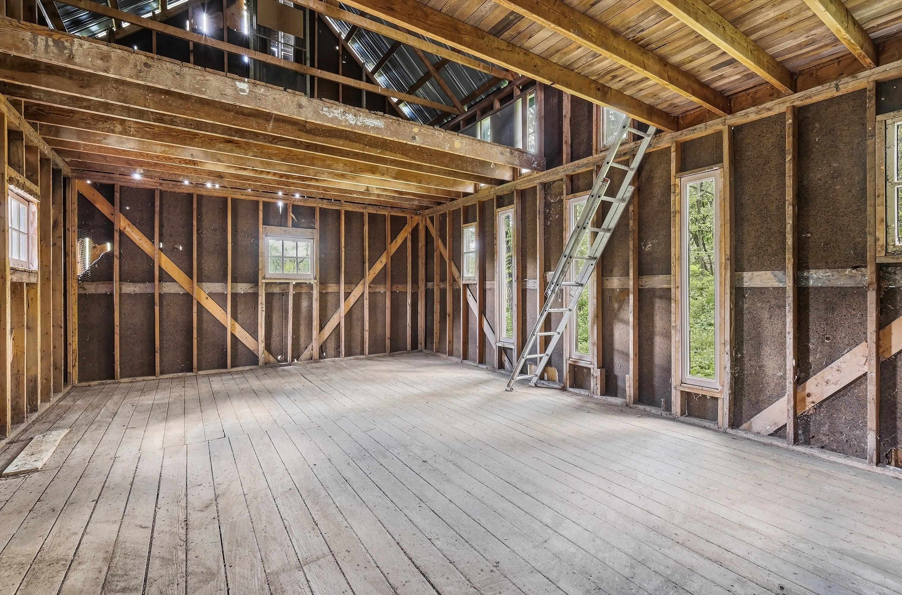 2562 West Blackjack Road Galena, IL 61036 - Photo 57 of 75 a view of an empty room with wooden floor